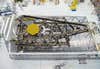 A birdâs-eye view of NASA Goddardâs cleanroom and the James Webb Space Telescopeâs test backplane and mirrors sitting in their packing case.