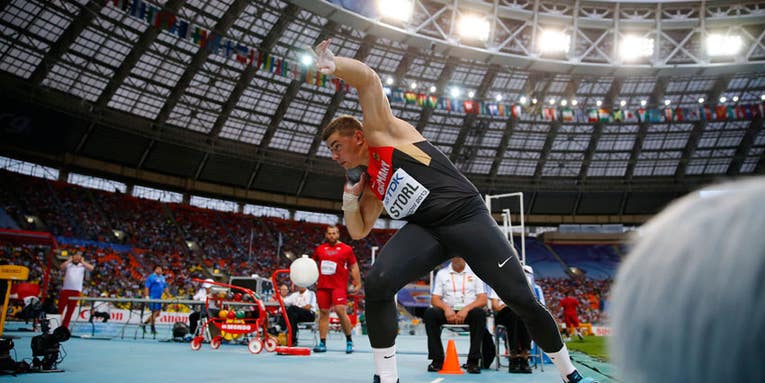 Photographer Saves Shotputter From Foul — and Wins Him the Gold Photographer Saves Shotputter From Foul — and Wins Him the Gold
