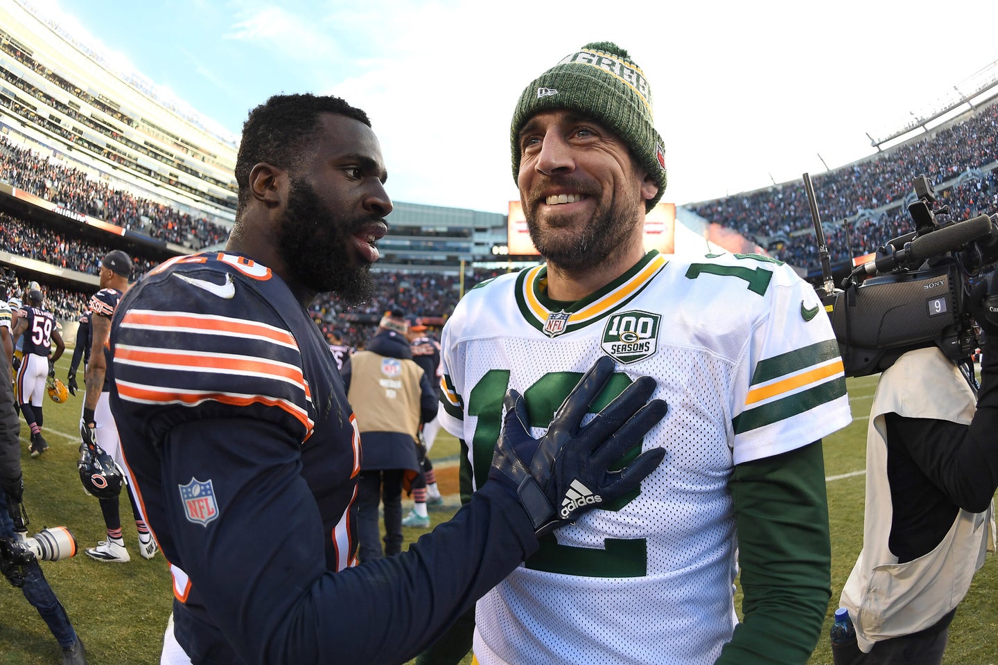 Chicago Bears cornerback Prince Amukamara shakes hands with Green Bay Packers quarterback Aaron Rodgers after a game between the two teams.